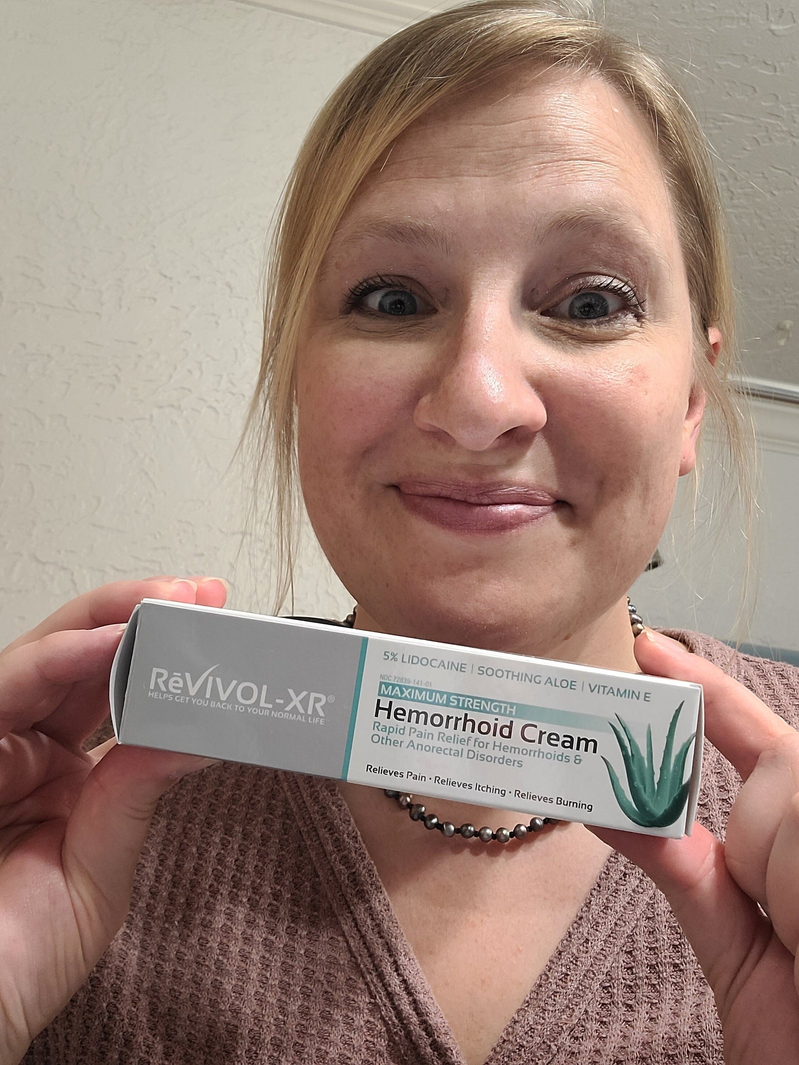 Lady with hemorrhoid cream