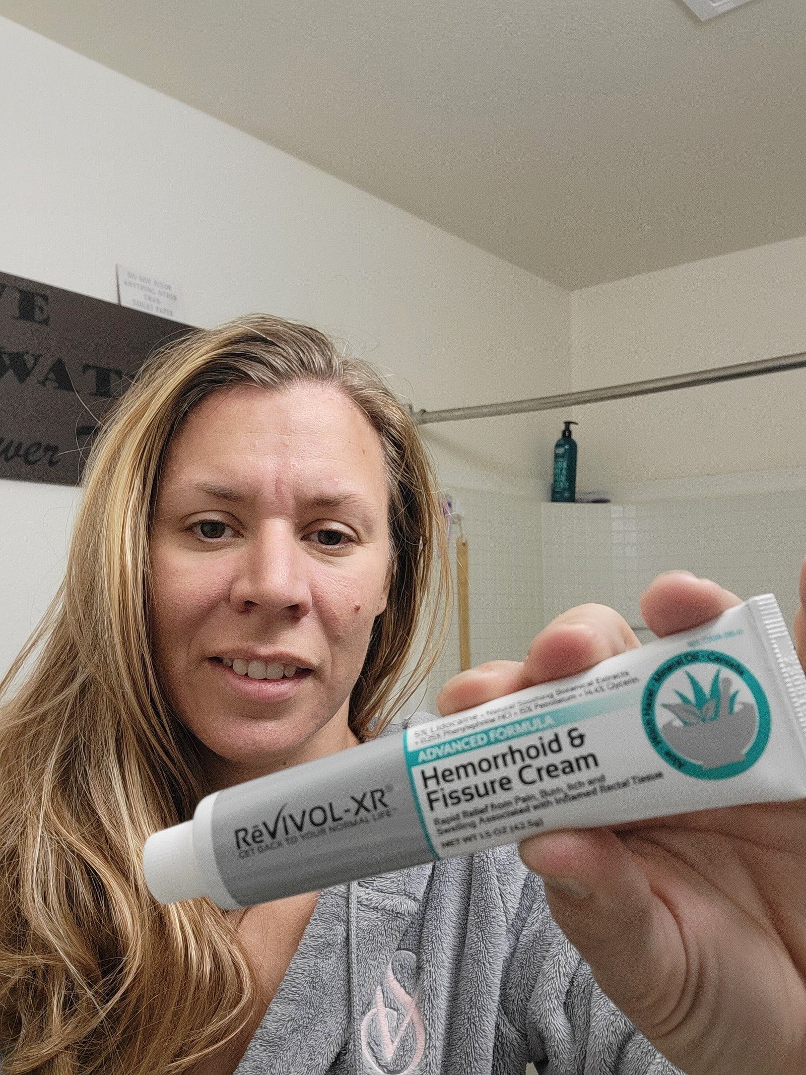 Lady with hemorrhoid cream